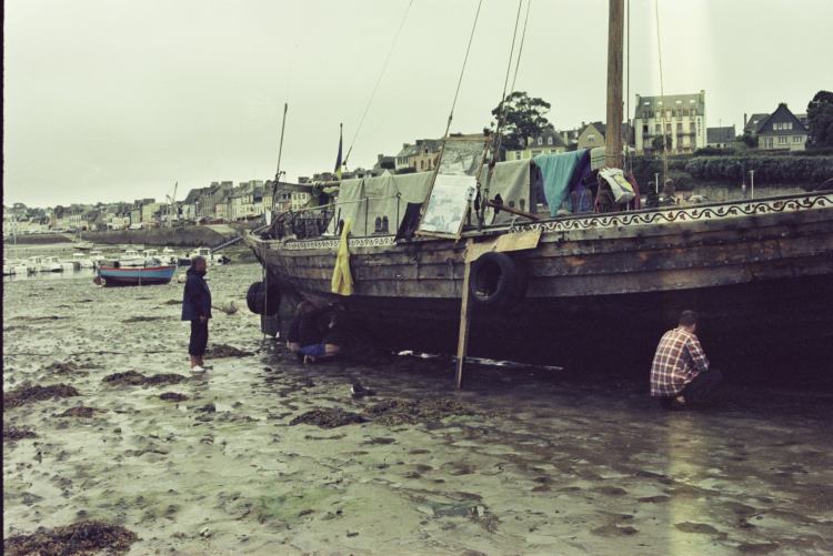 Латання отвору під час відпливу, Козацька чайка «Пресвята Покрова», Світлини Юліана Куклевського