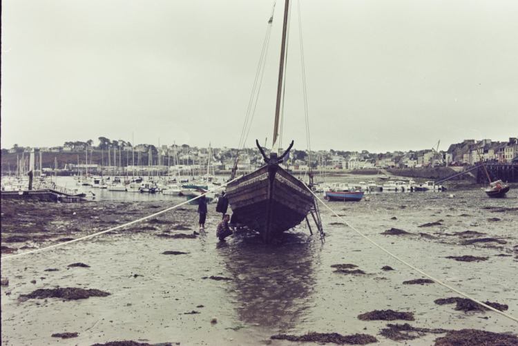 Латання отвору під час відпливу, Козацька чайка «Пресвята Покрова», Світлини Юліана Куклевського